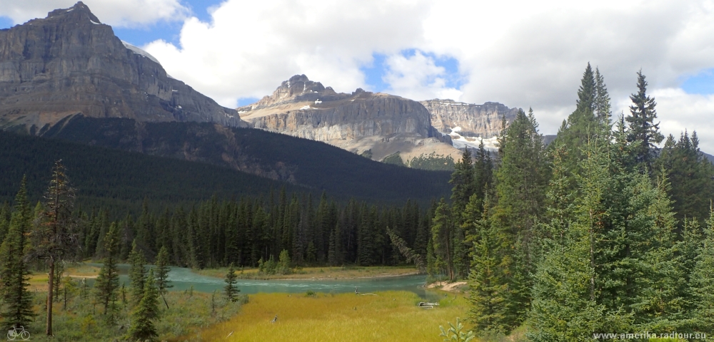 Cycling from Columbia Icefield via Saskatchewan River Crossing to Lake Louise.  Icefields Parkway by bicycle.