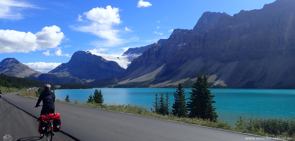 Cycling from Columbia Icefield via Saskatchewan River Crossing to Lake Louise.  Icefields Parkway by bicycle.