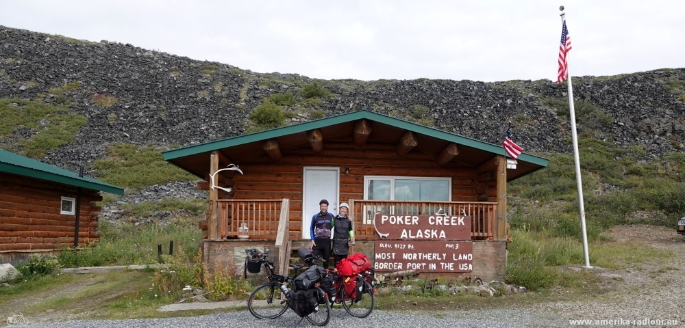 Cycling the Top of the World Highway westbound to Poker Creek. 